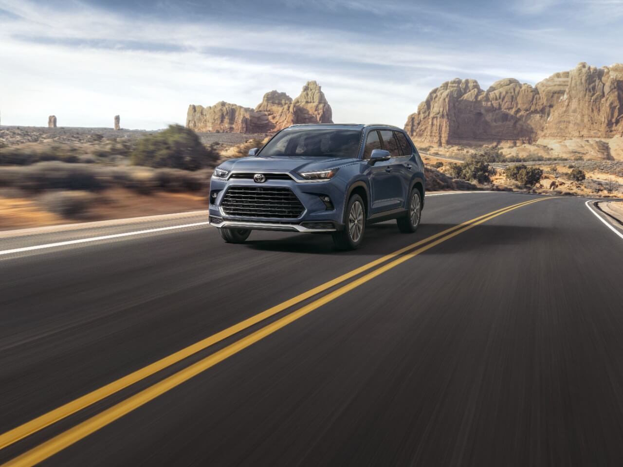 Used Toyota Grand Highlander on highway